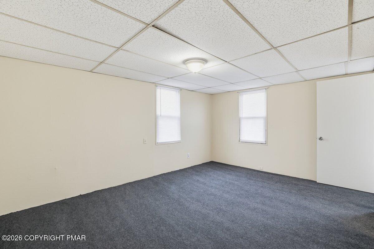 515 Breck Street Scranton, PA 18505 - Photo 27 of 38 a view of an empty room with a window