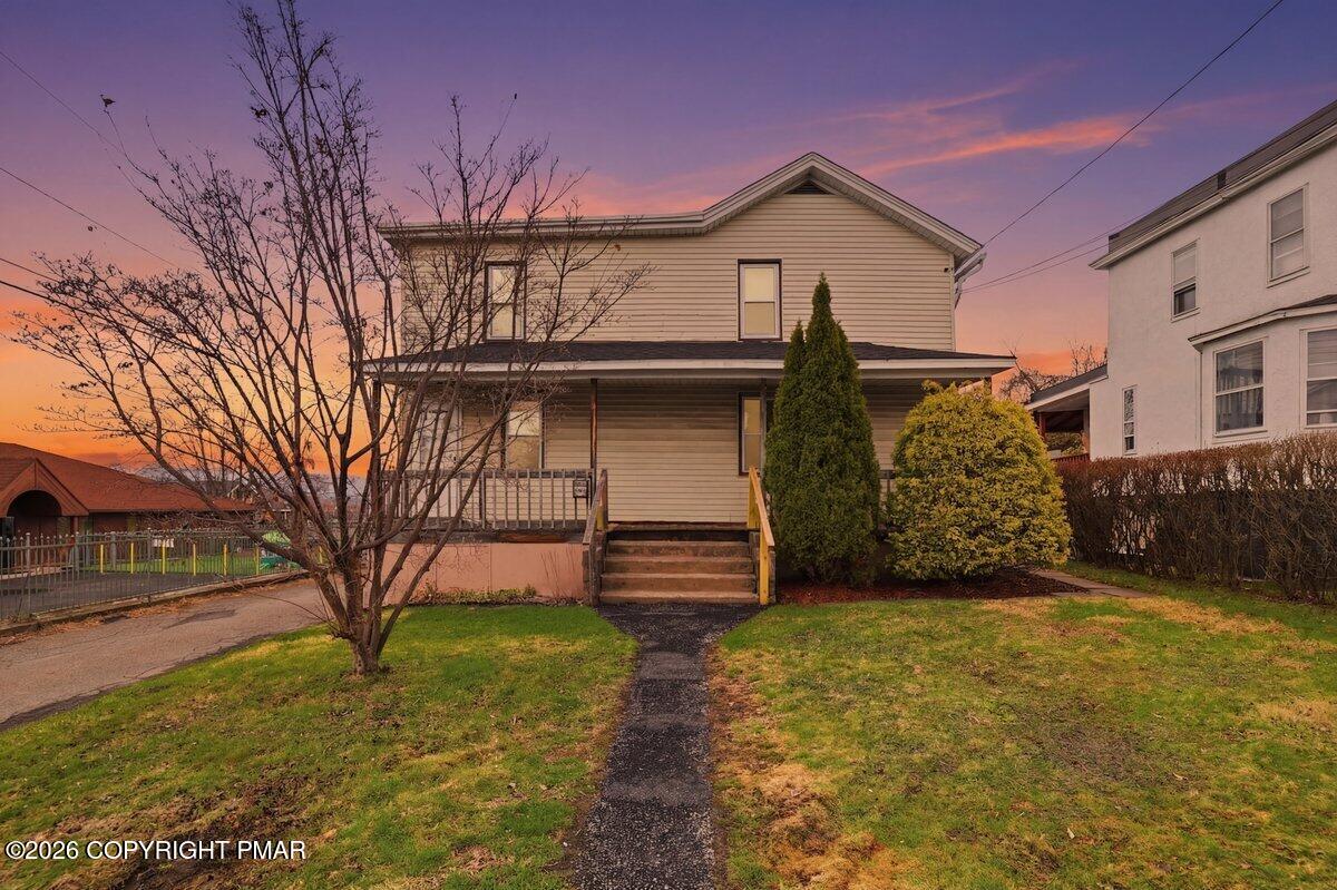 515 Breck Street Scranton, PA 18505 - Photo 38 of 38 a front view of a house with garden