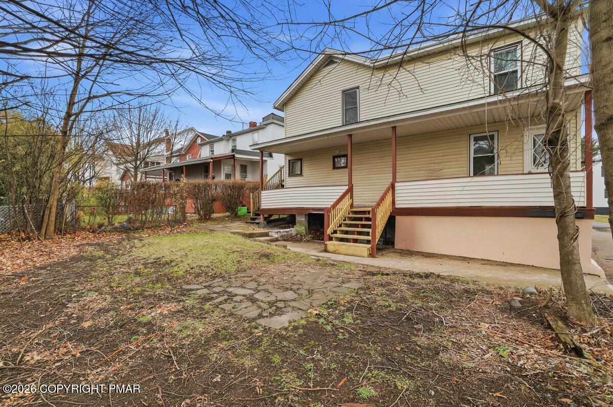 515 Breck Street Scranton, PA 18505 - Photo 5 of 38 a view of a house with a back yard