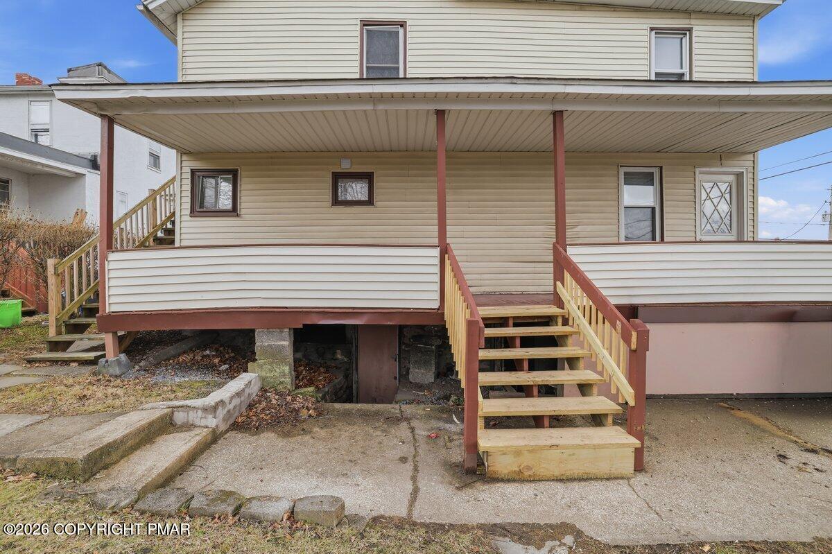515 Breck Street Scranton, PA 18505 - Photo 7 of 38 a front view of a house with a balcony
