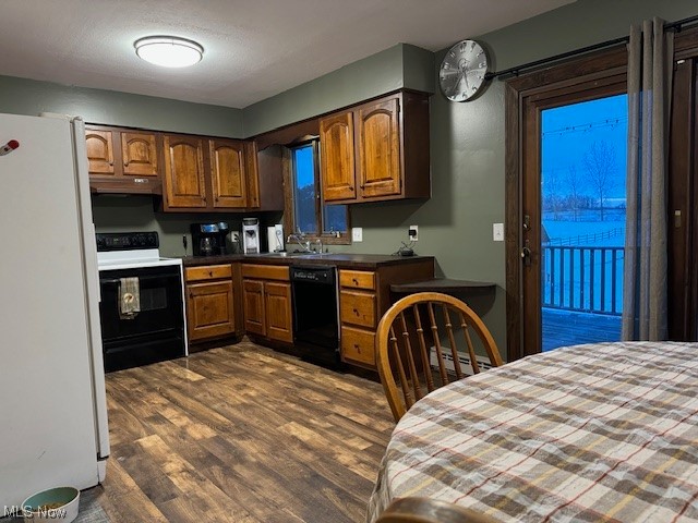8274 Ruff Road West Salem, OH 44287 - Photo 5 of 30 Kitchen featuring dark hardwood / wood-style flooring, sink, and white appliances