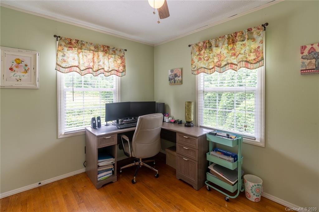 537 Souther Road Fletcher, NC 28732 - Photo 16 of 31 a view of a workspace with furniture and a window