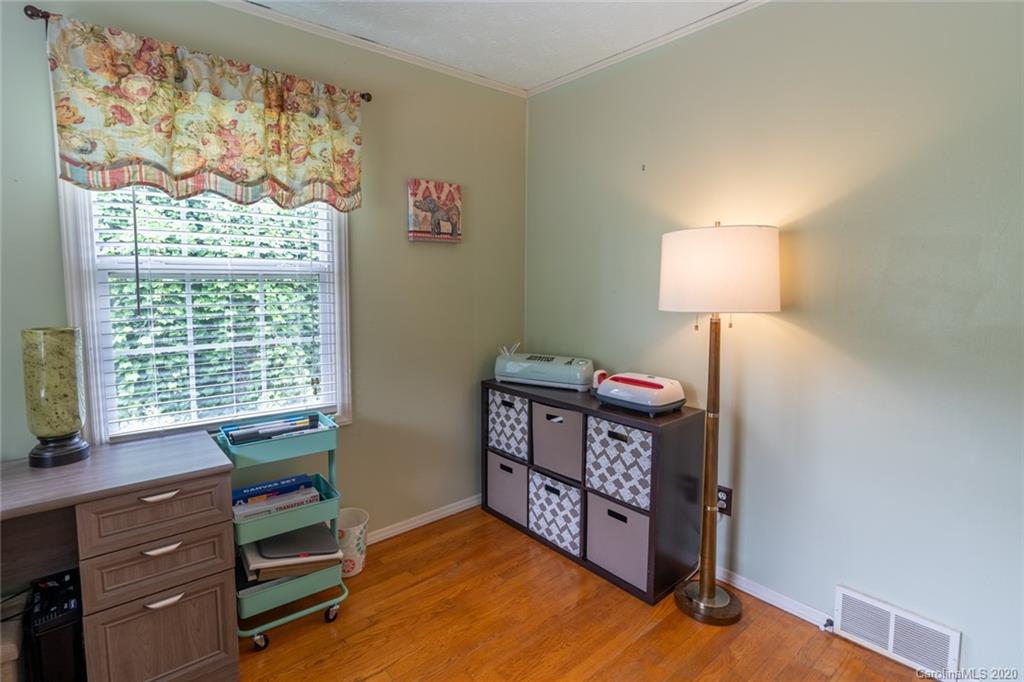 537 Souther Road Fletcher, NC 28732 - Photo 17 of 31 a living room with furniture and a window
