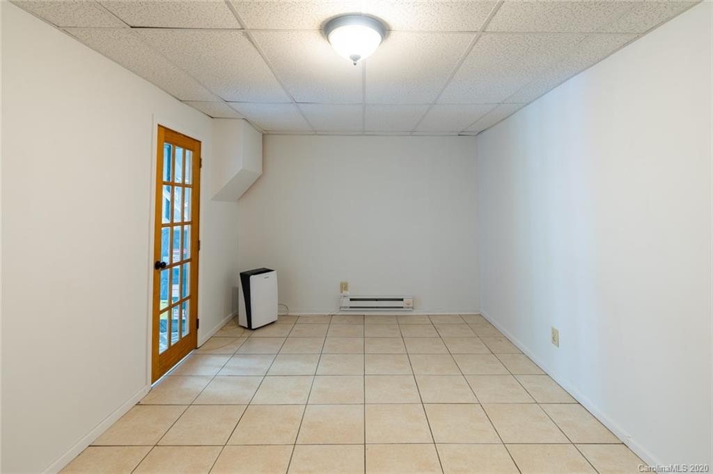 537 Souther Road Fletcher, NC 28732 - Photo 22 of 31 a view of an empty room with a window