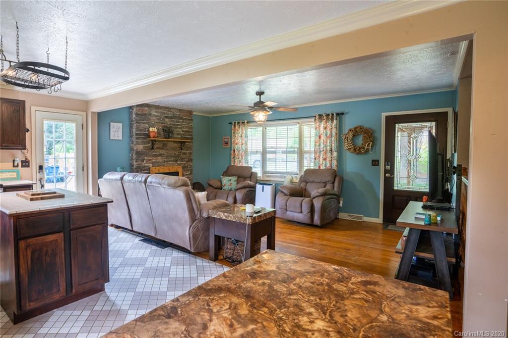 537 Souther Road Fletcher, NC 28732 - Photo 10 of 31 a living room with furniture and a large window