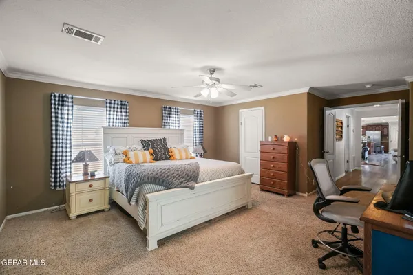a bed room with furniture and a window