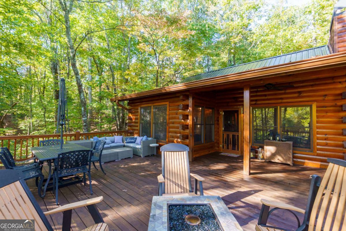 24 Casey Court Blue Ridge, GA 30513 - Photo 21 of 54 a front view of a house with patio