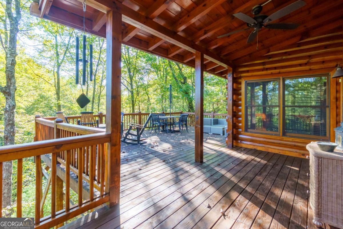 24 Casey Court Blue Ridge, GA 30513 - Photo 37 of 54 a view of a porch with wooden floor outdoor seating