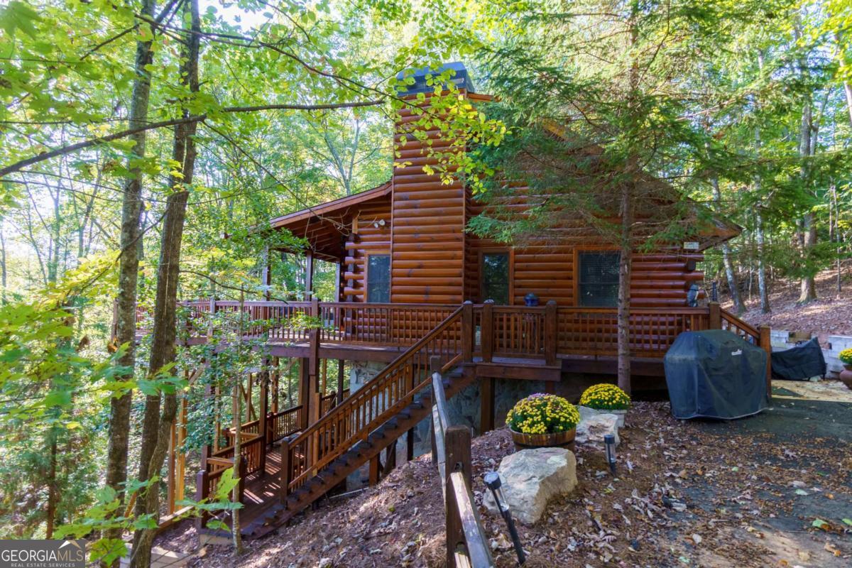 24 Casey Court Blue Ridge, GA 30513 - Photo 46 of 54 a view of a chairs and table in the backyard