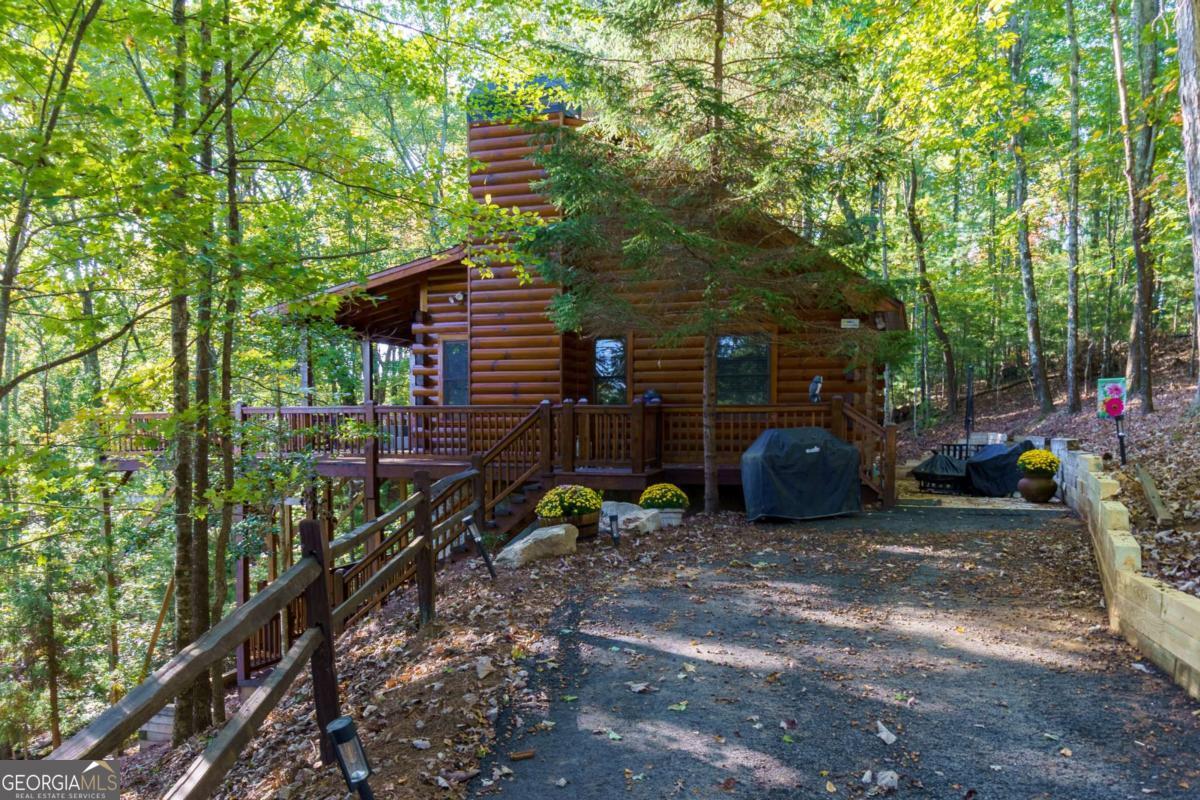 24 Casey Court Blue Ridge, GA 30513 - Photo 47 of 54 a view of a chair and table in the backyard