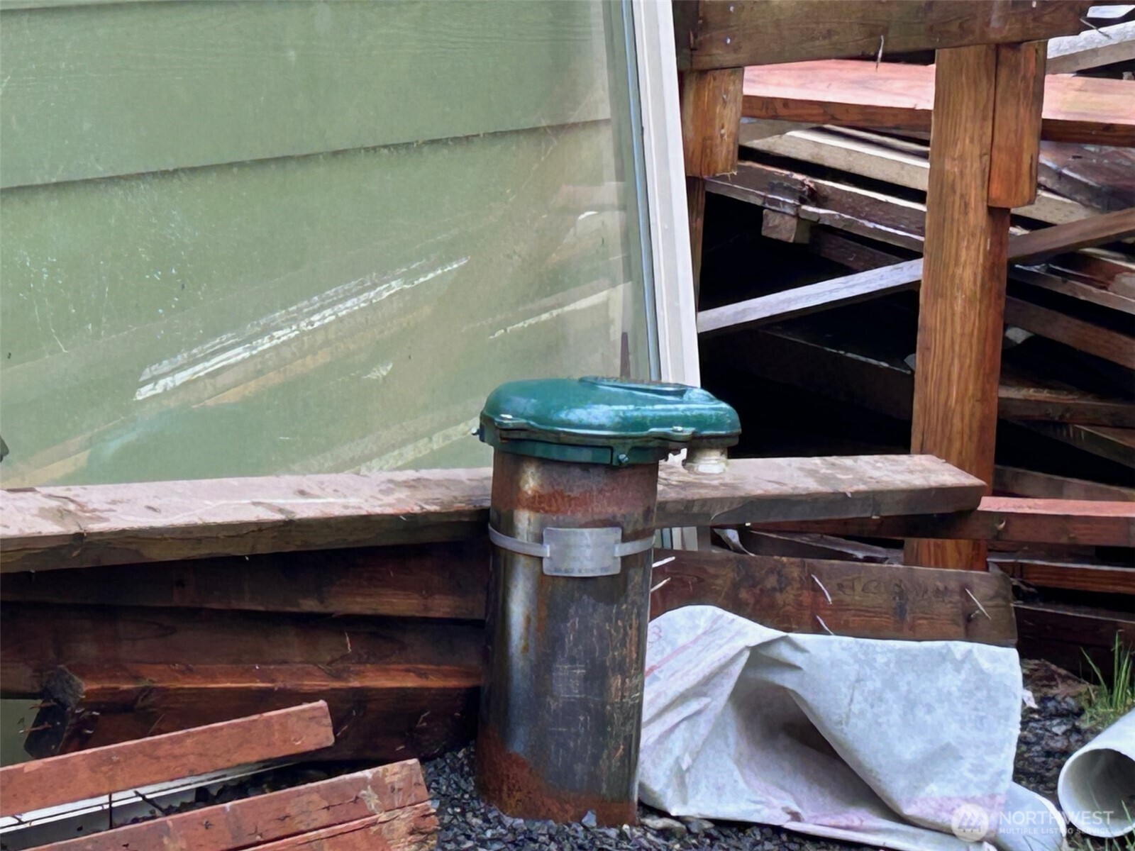 155 Ocean Beach Road Hoquiam, WA 98550 - Photo 13 of 21 a view of room with furniture and a fireplace