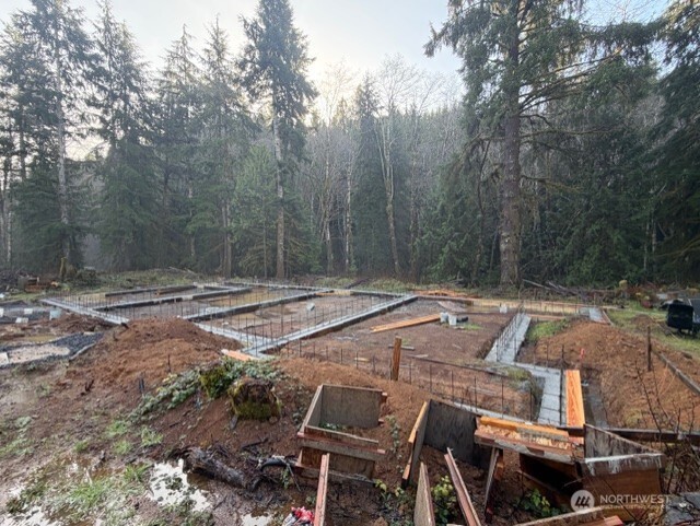 155 Ocean Beach Road Hoquiam, WA 98550 - Photo 2 of 21 a view of backyard with swimming pool and seating