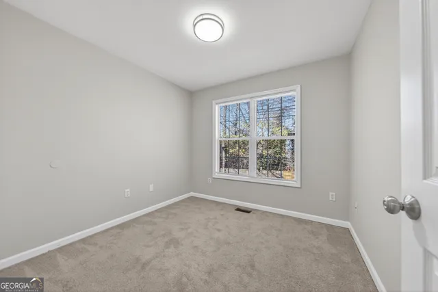 an empty room with a window