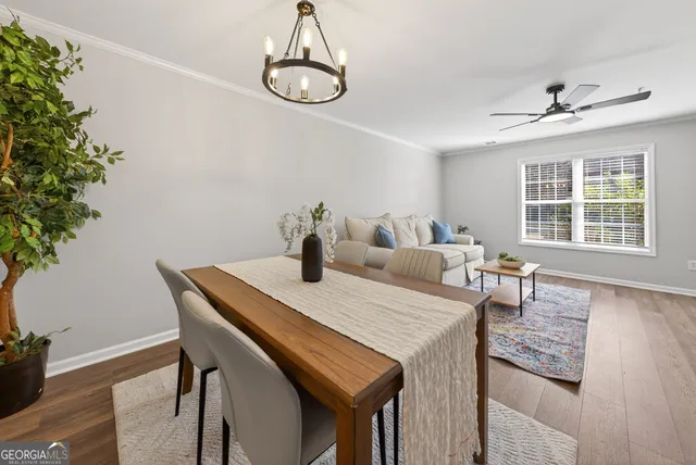 a kitchen with stainless steel appliances granite countertop a refrigerator a stove a sink and dishwasher