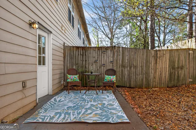 a view of swimming pool with outdoor seating and city view