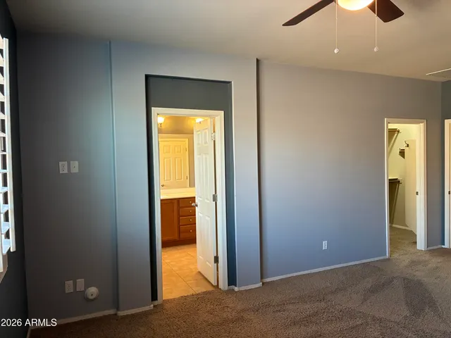 a bathroom with a shower and a tub