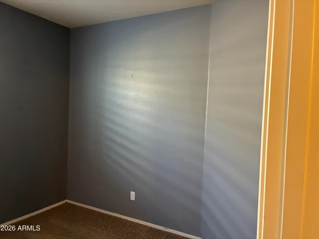 a view of a backyard of the house