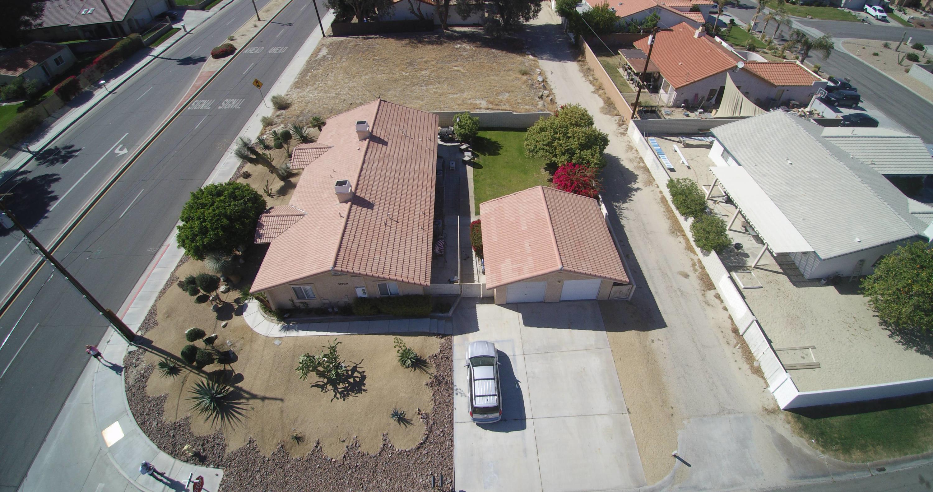41929 Front Hall Road Bermuda Dunes, CA 92203 - Photo 1 of 12 an aerial view of a house with a swimming pool