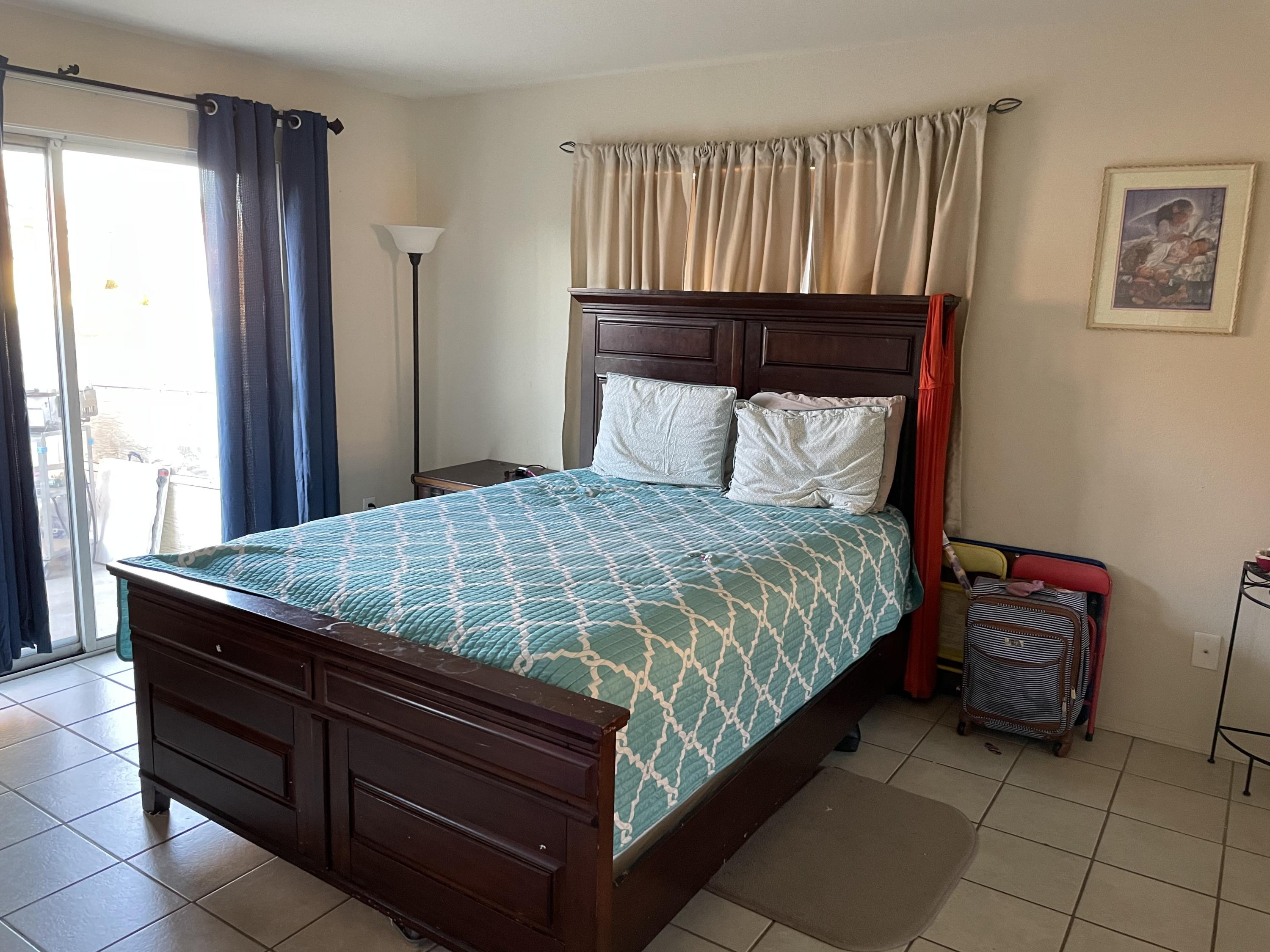 41929 Front Hall Road Bermuda Dunes, CA 92203 - Photo 4 of 12 a bedroom with a bed and window