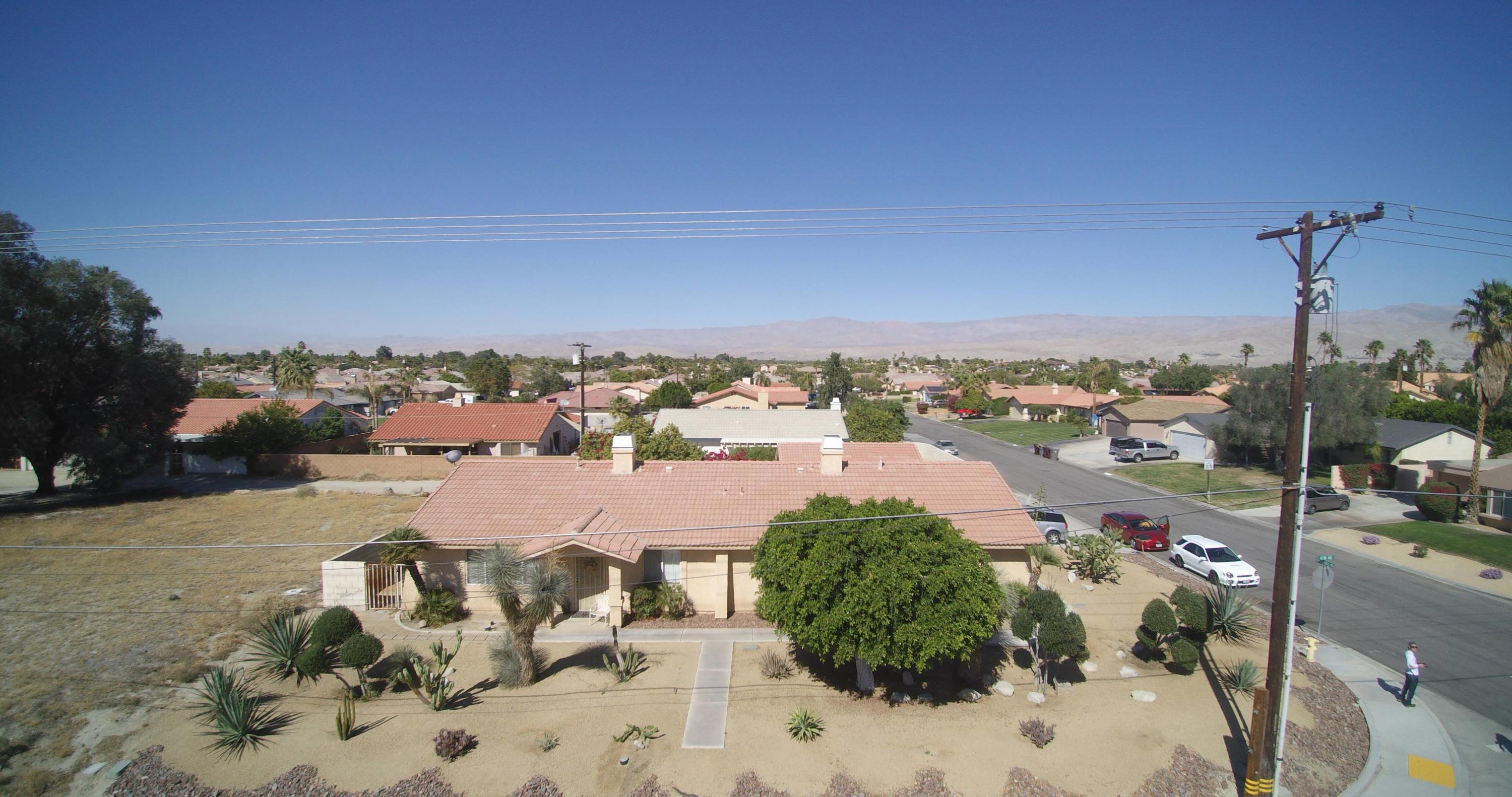41929 Front Hall Road Bermuda Dunes, CA 92203 - Photo 7 of 12 a view of a city with tall buildings