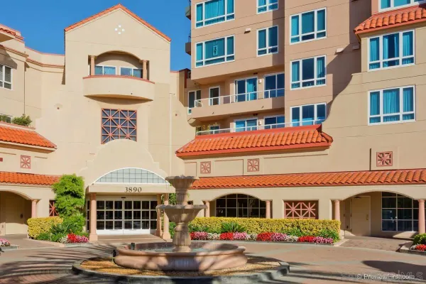 a living room with furniture and a rug
