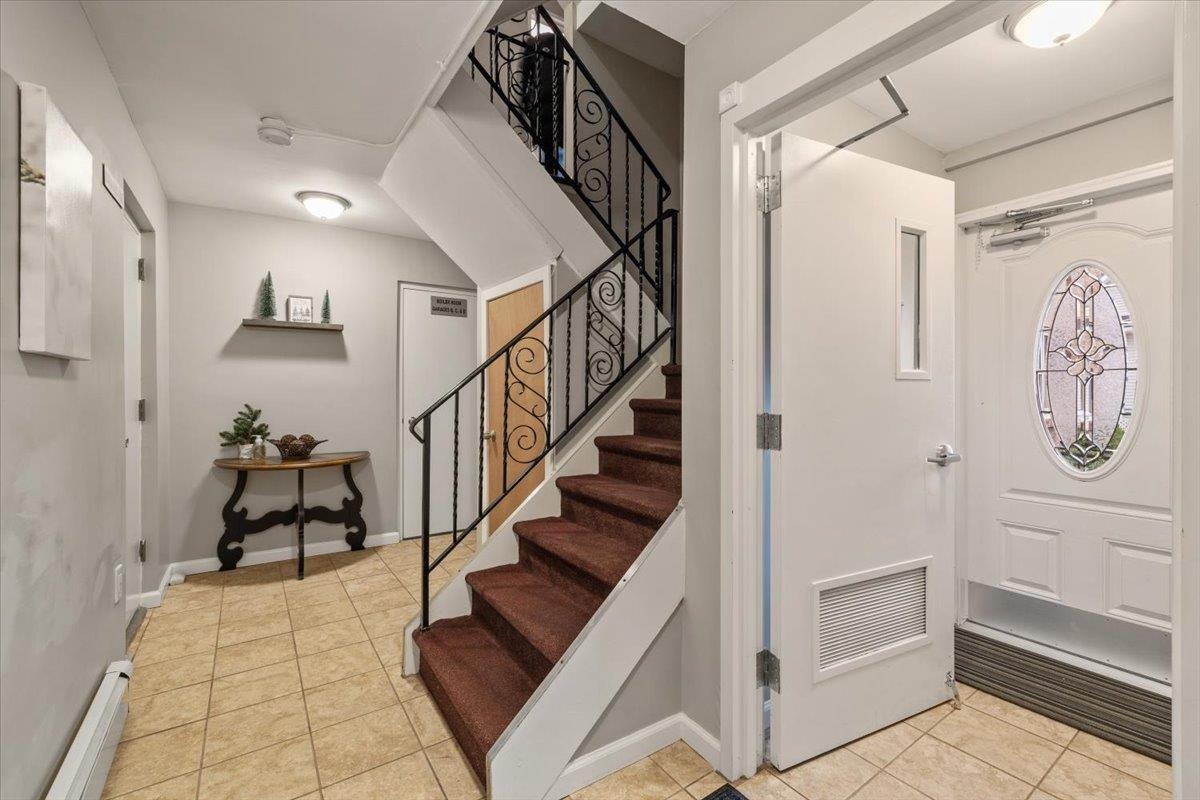 1138F Farm Road, Unit B Secaucus, NJ 07094 - Photo 18 of 20 a view of entryway with stairs and furniture