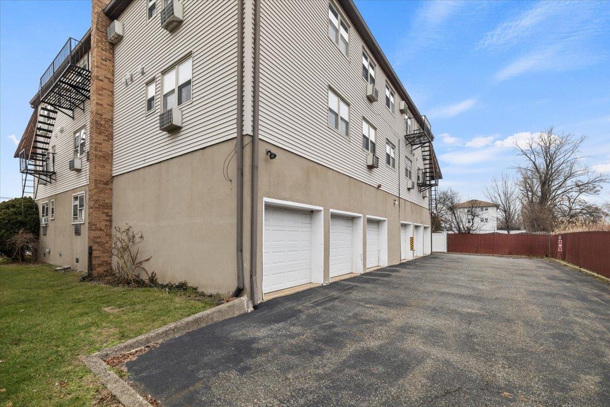 1138F Farm Road, Unit B Secaucus, NJ 07094 - Photo 20 of 20 a view of a building with a tree