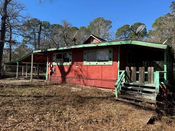 a view of a barn with a yard