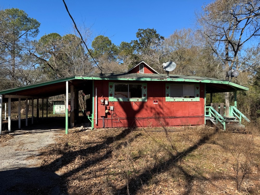 24532 Tyrone Street Hempstead, TX 77445 - Photo 5 of 11 a view of a barn with a yard