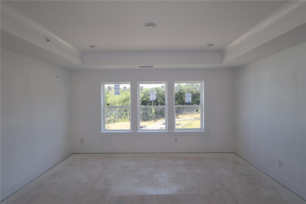 230 Redbud Road Canton, GA 30114 - Photo 8 of 11 an empty room with a window