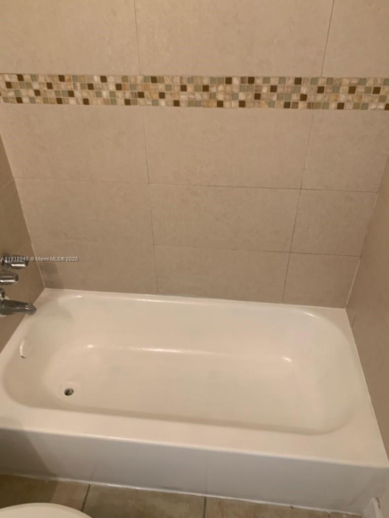 12309 Southwest 250th Street Homestead, FL 33032 - Photo 19 of 26 a bathroom with a bathtub