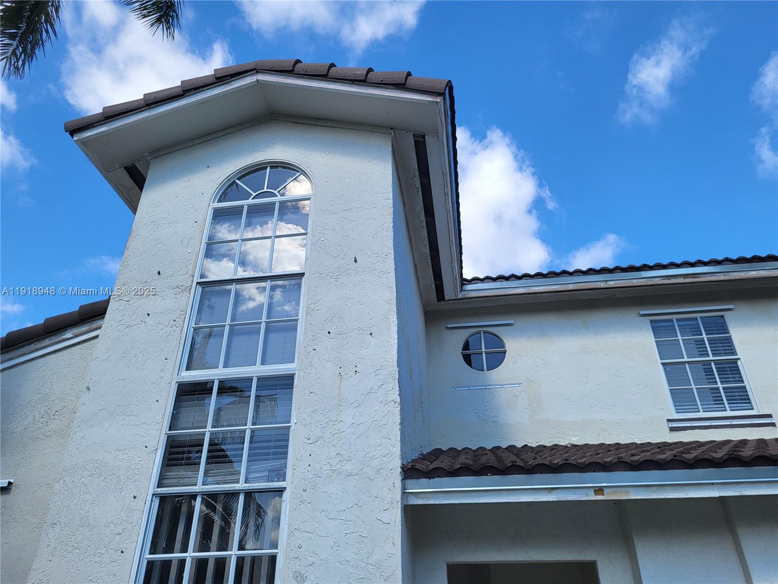 12309 Southwest 250th Street Homestead, FL 33032 - Photo 2 of 26 a view of a front door of the house