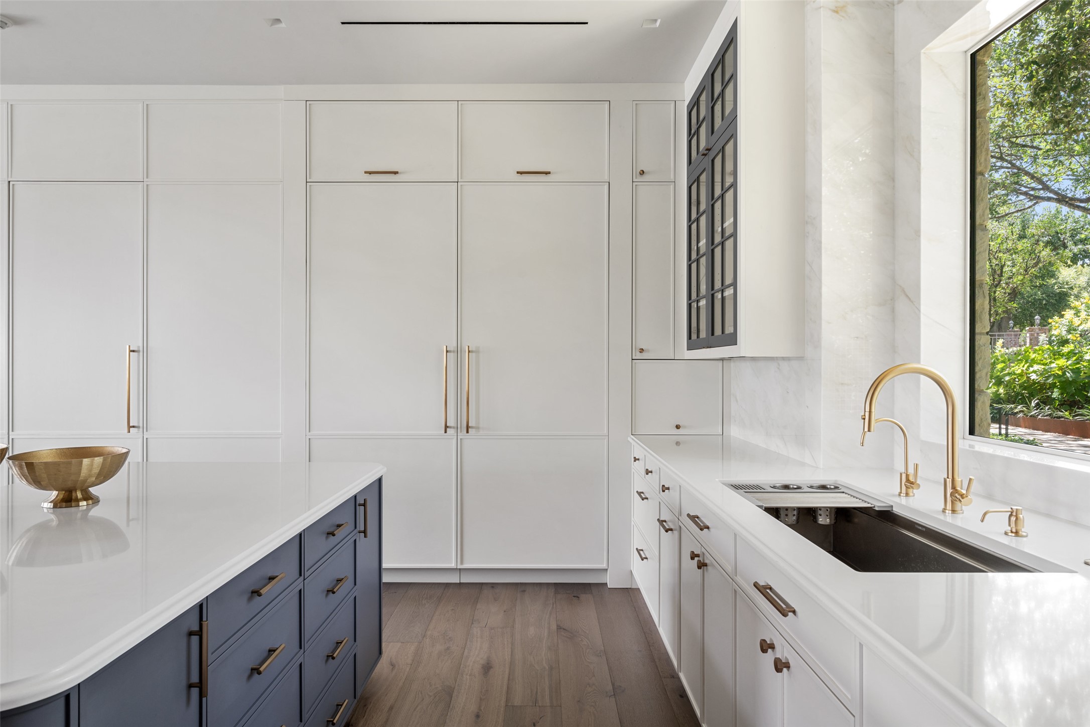 3111 Above Stratford Place Austin, TX 78746 - Photo 13 of 40 a kitchen with a sink and cabinets