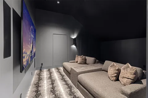 a bedroom with bed and a night stand