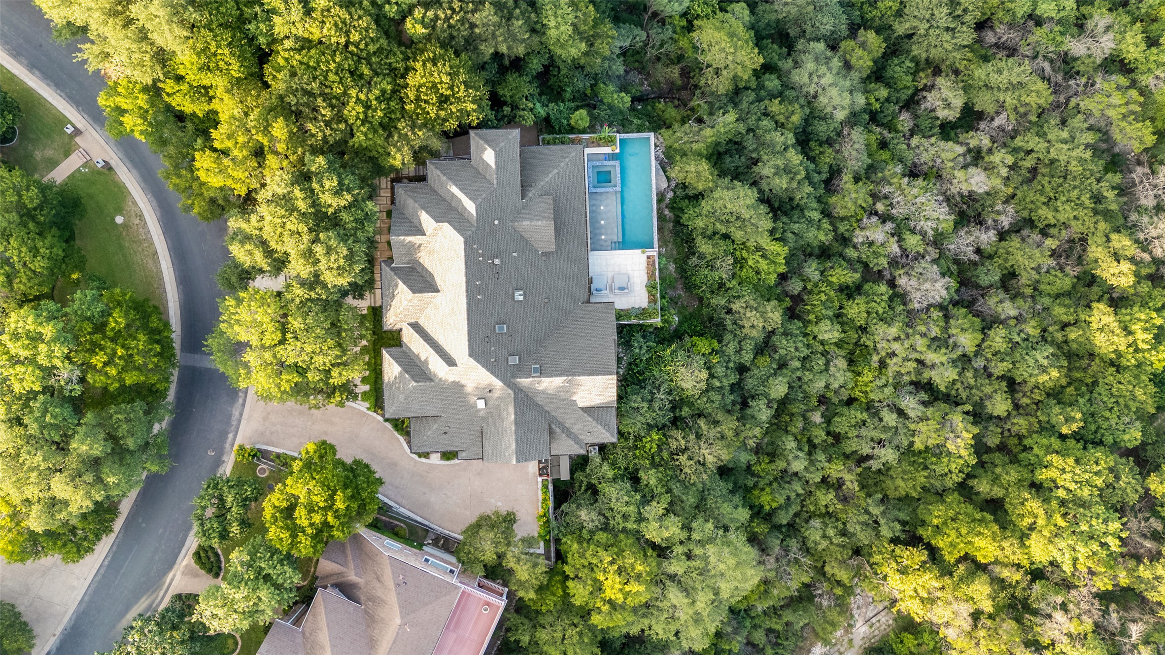 3111 Above Stratford Place Austin, TX 78746 - Photo 33 of 40 an aerial view of a house with a yard and garden