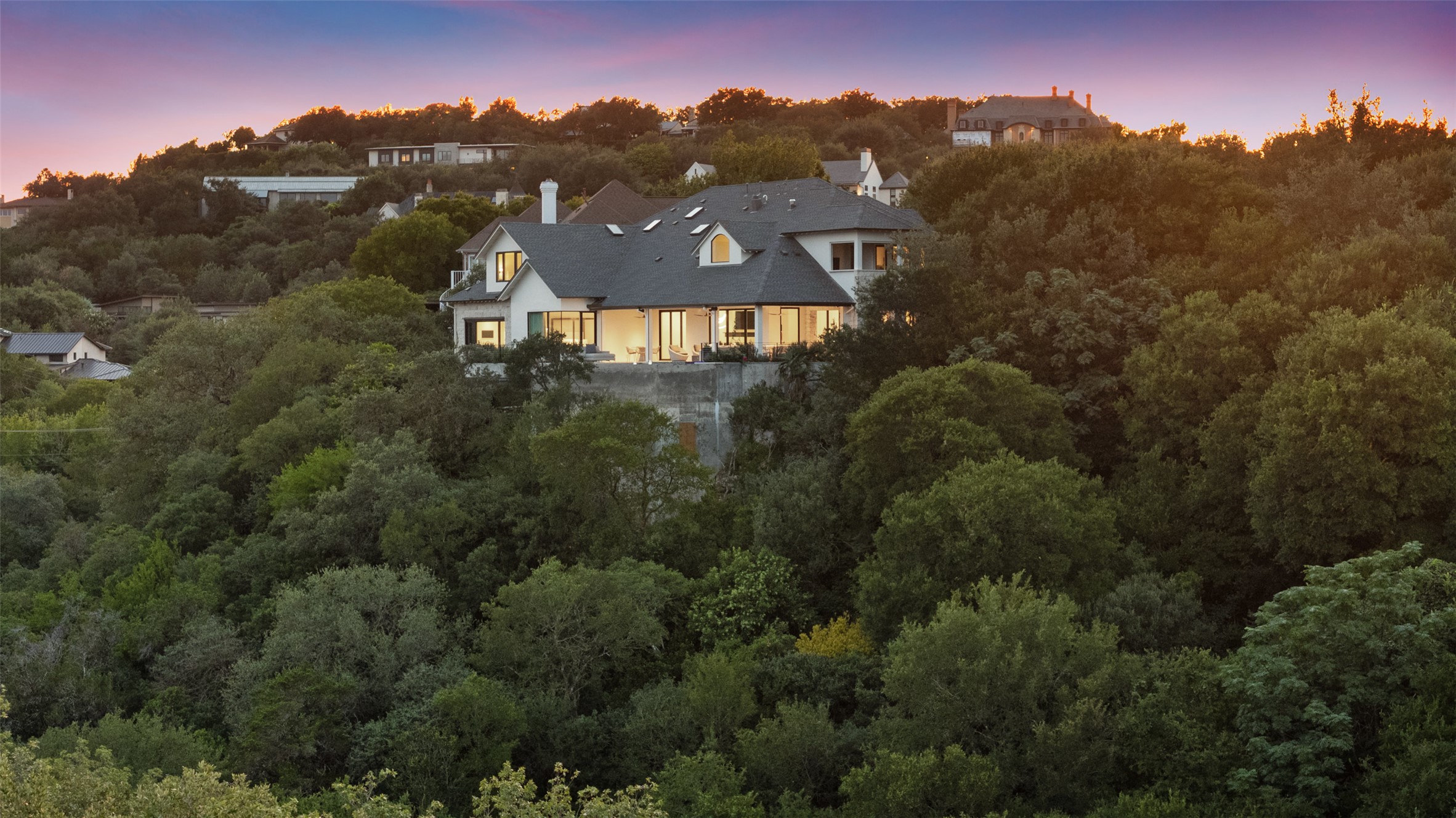 3111 Above Stratford Place Austin, TX 78746 - Photo 35 of 40 an aerial view of houses with a yard and mountain view