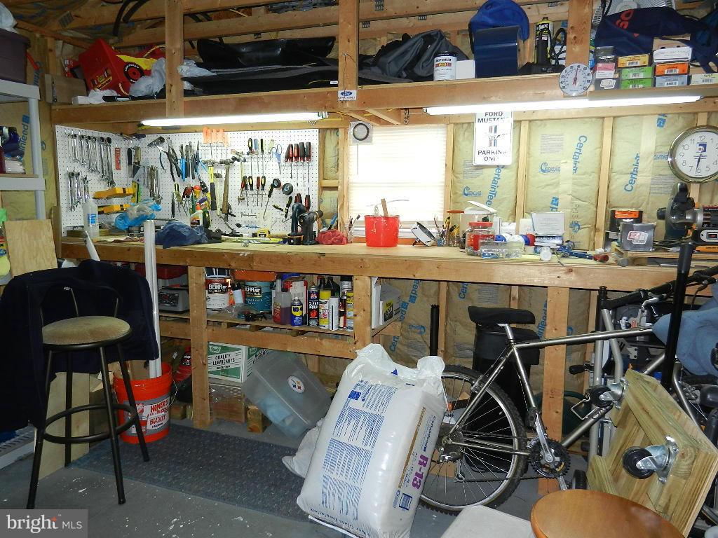 10337 Abbott Road Manassas, VA 20110 - Photo 30 of 30 Garage workshop and additional storage. 27x13.