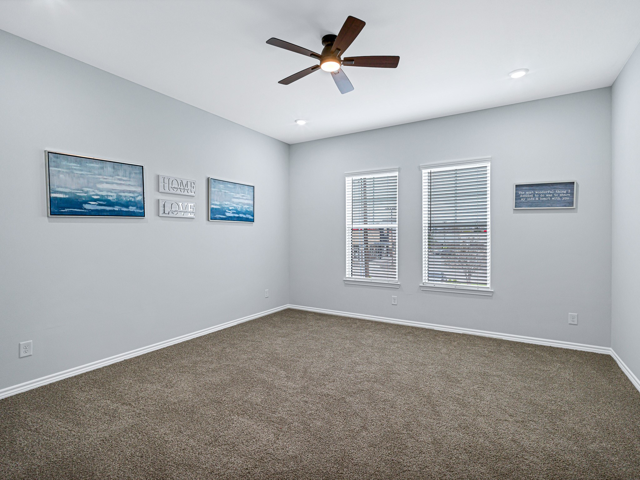 2720 Spence Street Houston, TX 77093 - Photo 21 of 30 a view of a livingroom with a ceiling fan and window