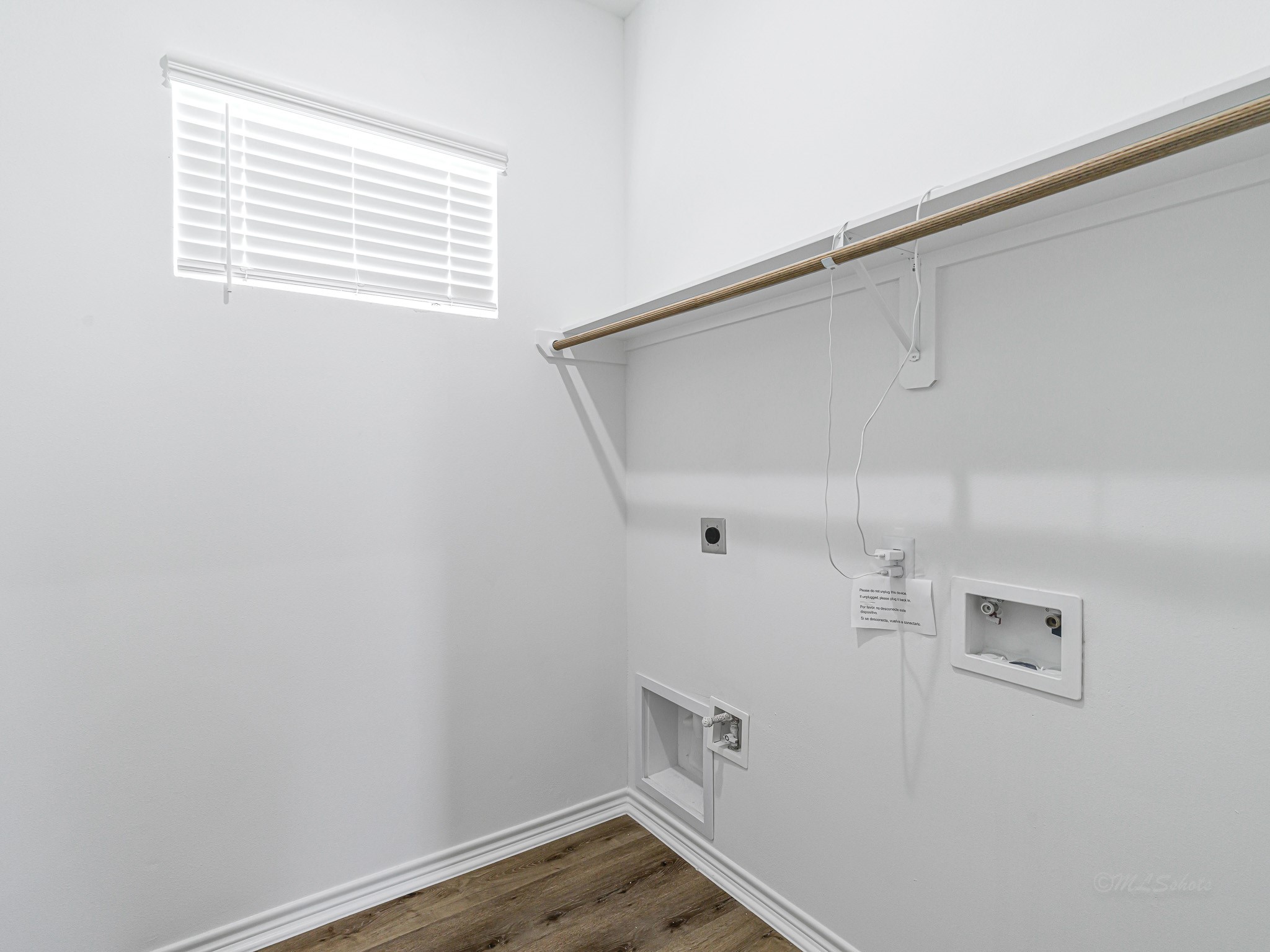2720 Spence Street Houston, TX 77093 - Photo 26 of 30 a view of small space with racks on the wall