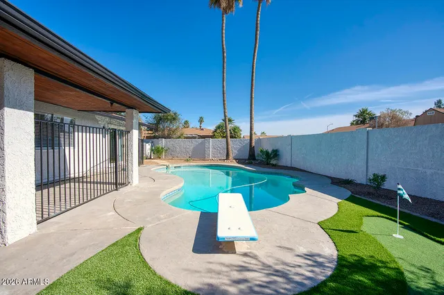 a view of a backyard with a patio