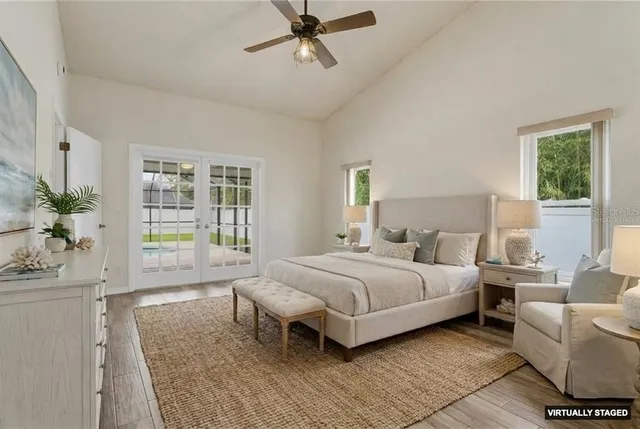 a bathroom with a granite countertop toilet a sink and a mirror