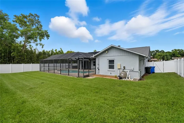 an aerial view of a house with a garden