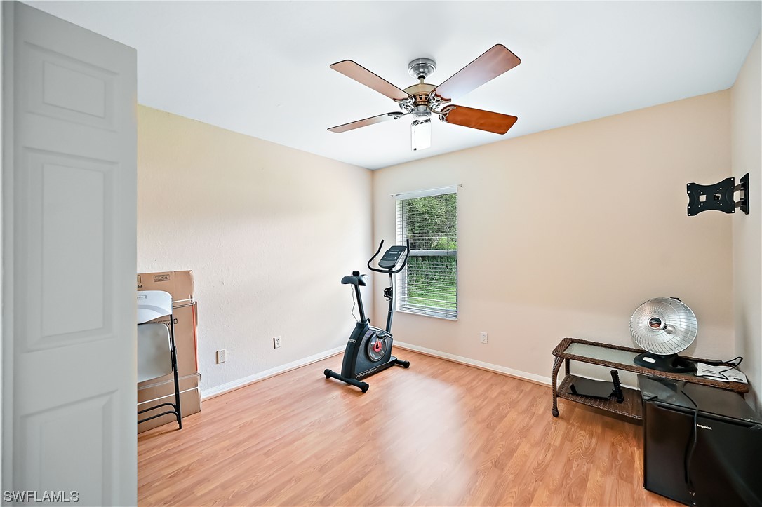 3535 18th Avenue Southeast Naples, FL 34117 - Photo 20 of 32 a view of a room with gym equipment