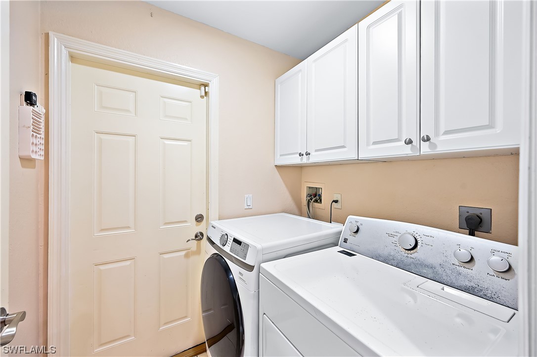 3535 18th Avenue Southeast Naples, FL 34117 - Photo 25 of 32 a utility room with dryer and washer