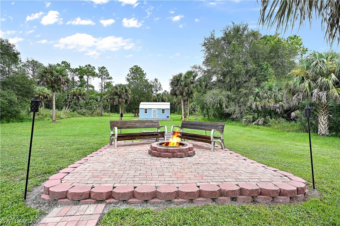 3535 18th Avenue Southeast Naples, FL 34117 - Photo 28 of 32 a view of a park with a slide