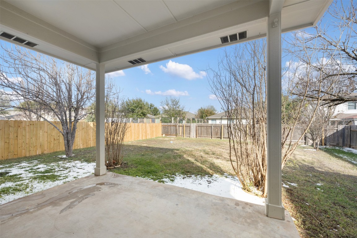 15216 Mandarin Crossing Pflugerville, TX 78660 - Photo 35 of 40 Fenced backyard featuring a patio