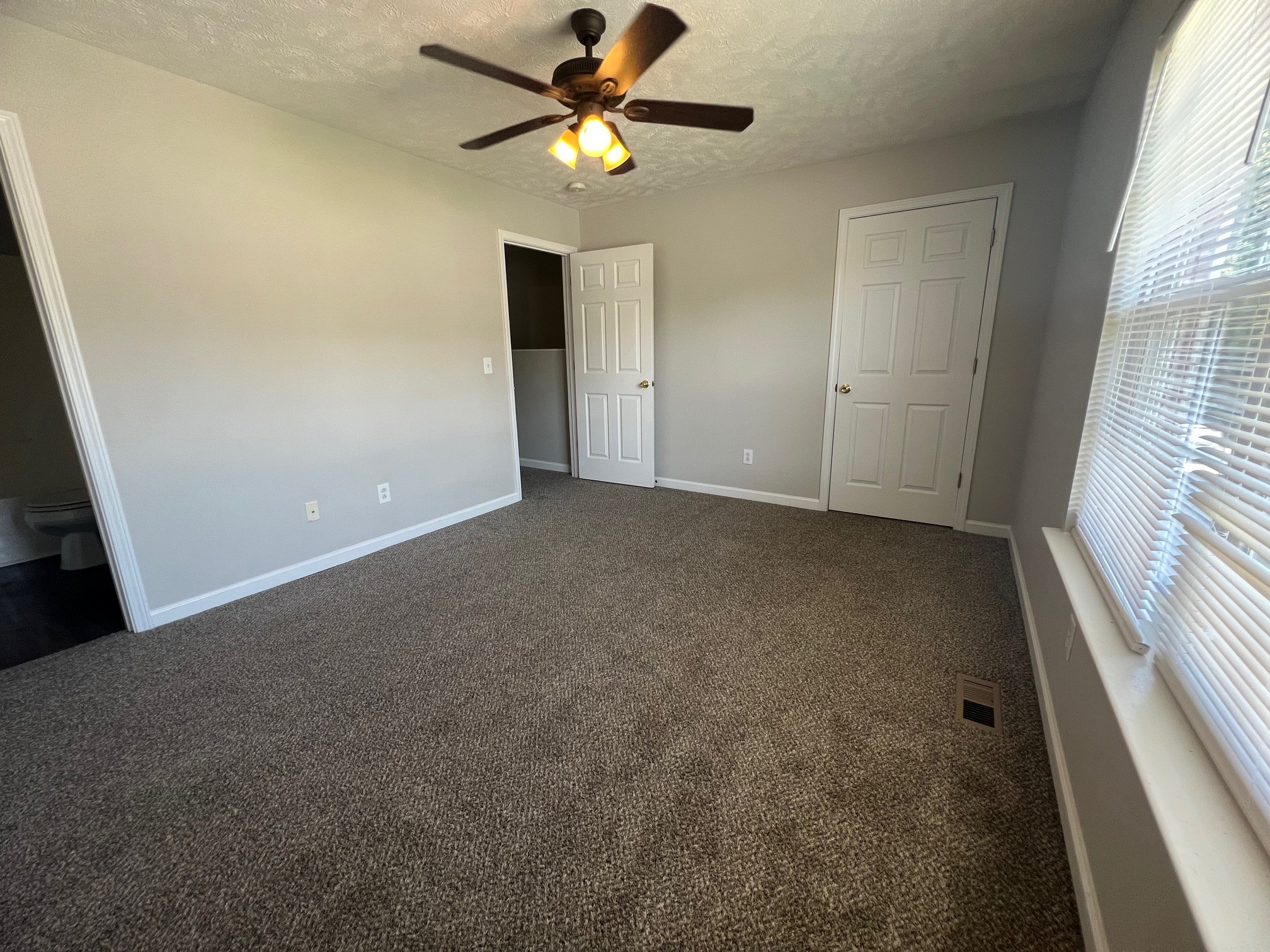 1512 Center Pointe Drive Murfreesboro, TN 37130 - Photo 15 of 18 an empty room with windows and fan