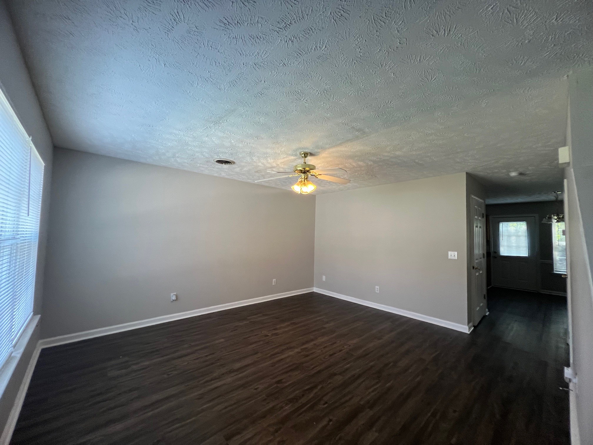 1512 Center Pointe Drive Murfreesboro, TN 37130 - Photo 2 of 18 a view of a room with wooden floor and a ceiling fan