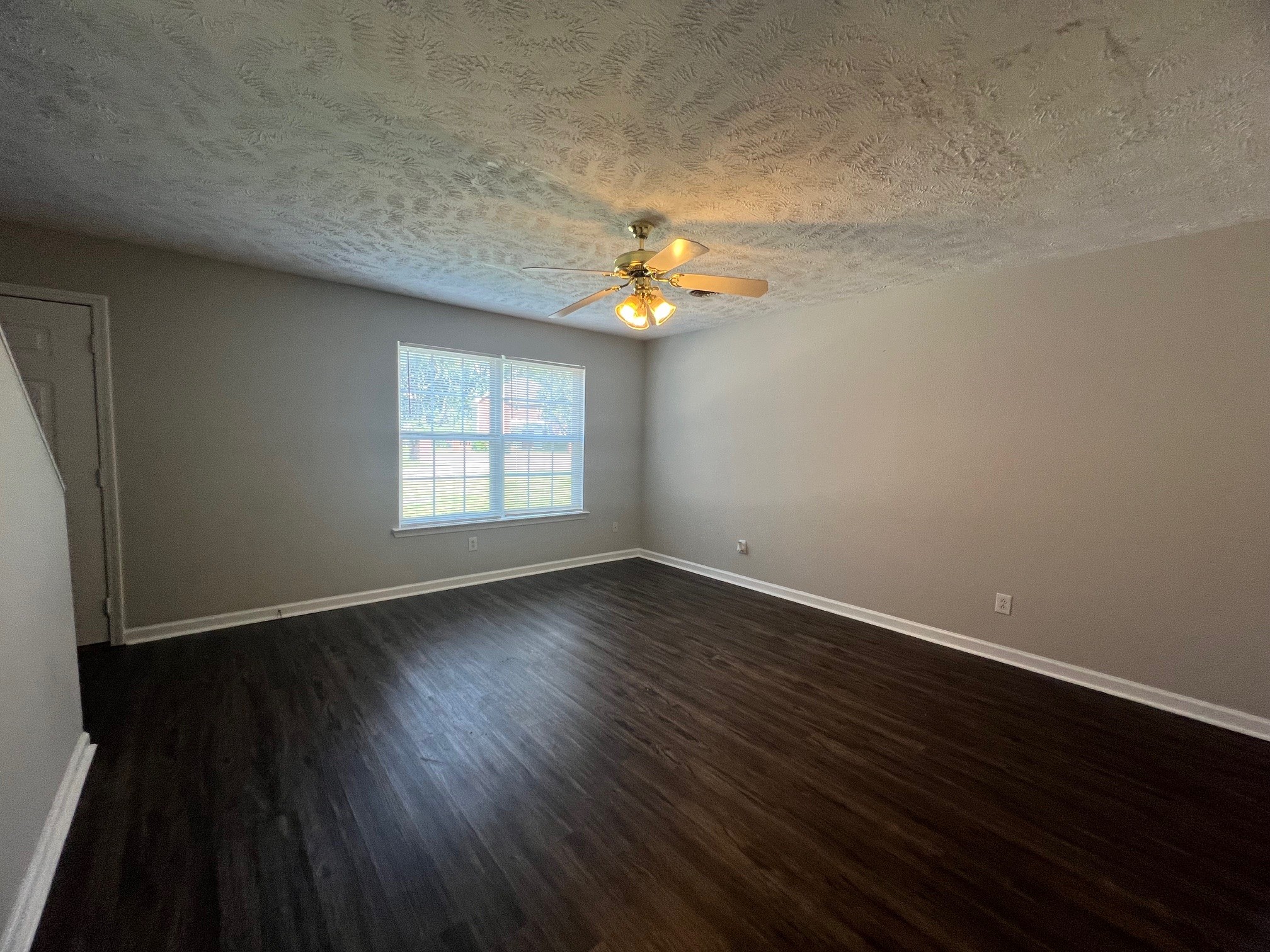 1512 Center Pointe Drive Murfreesboro, TN 37130 - Photo 3 of 18 an empty room with wooden floor and windows