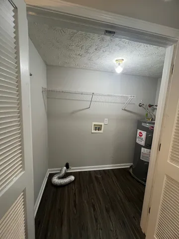 a view of a hallway with storage space